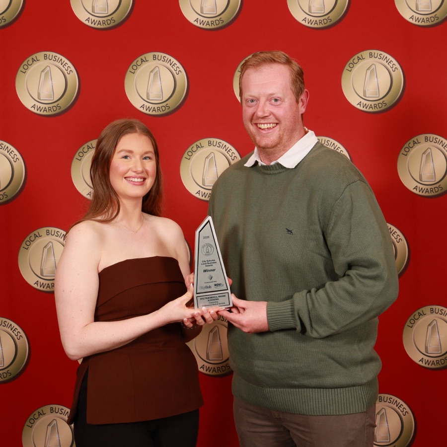 The Spectrum Alexandria team receiving the 2026 Local Business Award